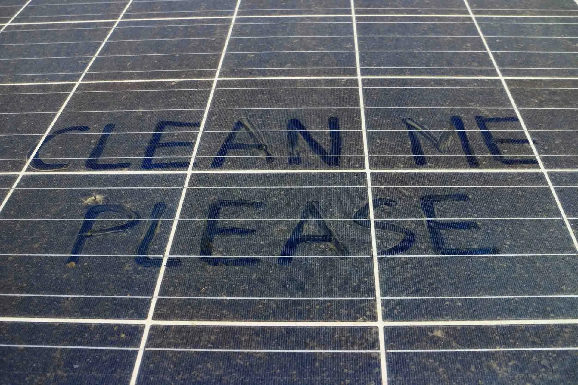 Dusty solar panels before cleaning